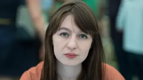 The acclaimed novelist claims she will not travel to the UK due to legal concerns
